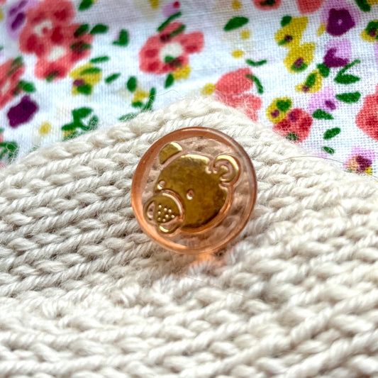 bamse glasknap rosa med guld bamse 12mm